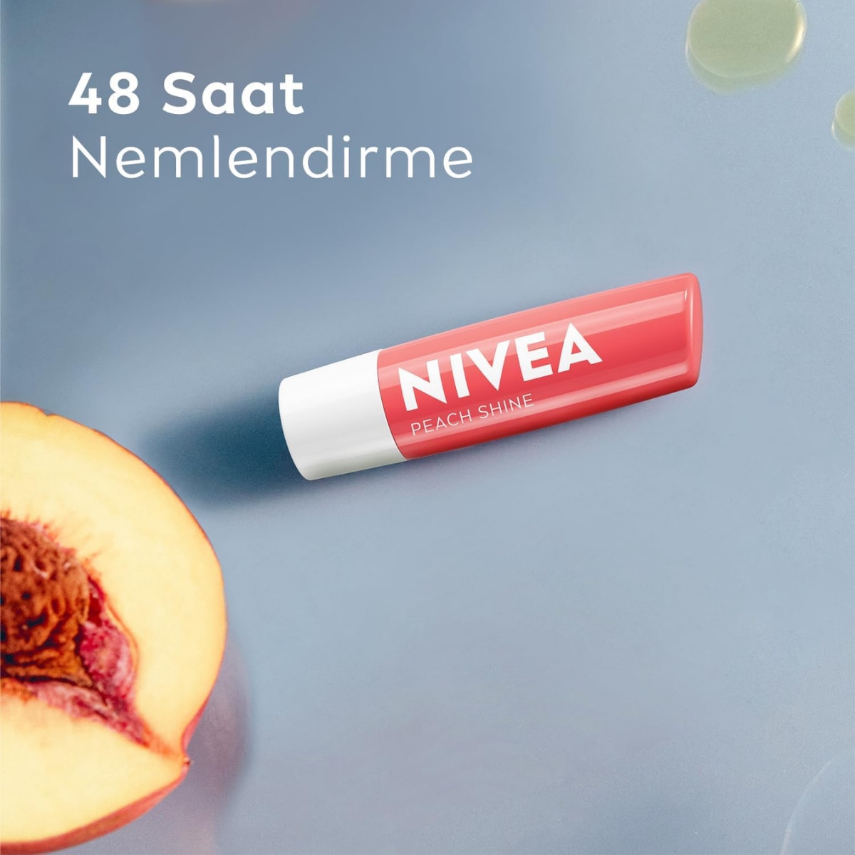  NIVEA LIP CARE NIVEA LIP CARE Nivea Dudak Bakım Kremi ve Dudak Parlatıcısı Şeftali 4,8 g 24 Saat Nem  1 of 6 