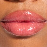 REVOLUTION POUT LIP GLOSS STICK SHIM. SUGAR COOKIE
