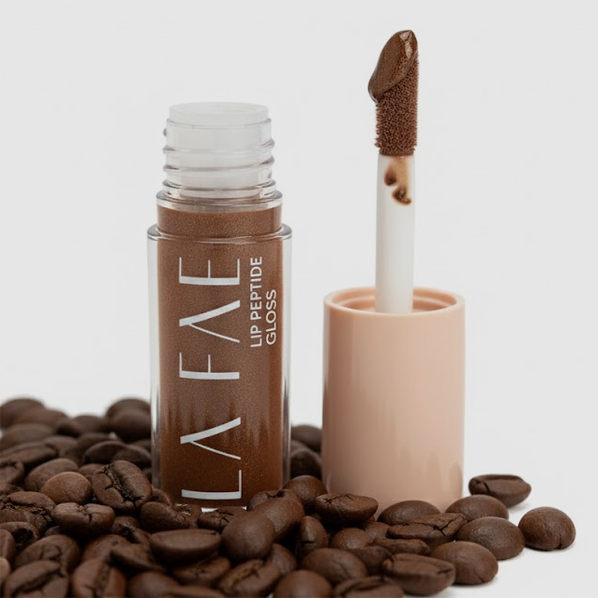  LA FAE LA FAE La Faé Lip Peptide Gloss Espresso Shine  1 of 7 