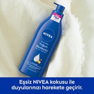 NIVEA BODY NIVEA BODY Nivea Besleyici Vücut Sütü 400 ml Kuru ve Çok Kuru Ciltler 48 Saat Nemlendirici E Vitamini ve Badem Yağı 1 of 7