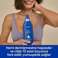 NIVEA BODY NIVEA BODY Nivea Besleyici Vücut Sütü 400 ml Kuru ve Çok Kuru Ciltler 48 Saat Nemlendirici E Vitamini ve Badem Yağı 1 of 7