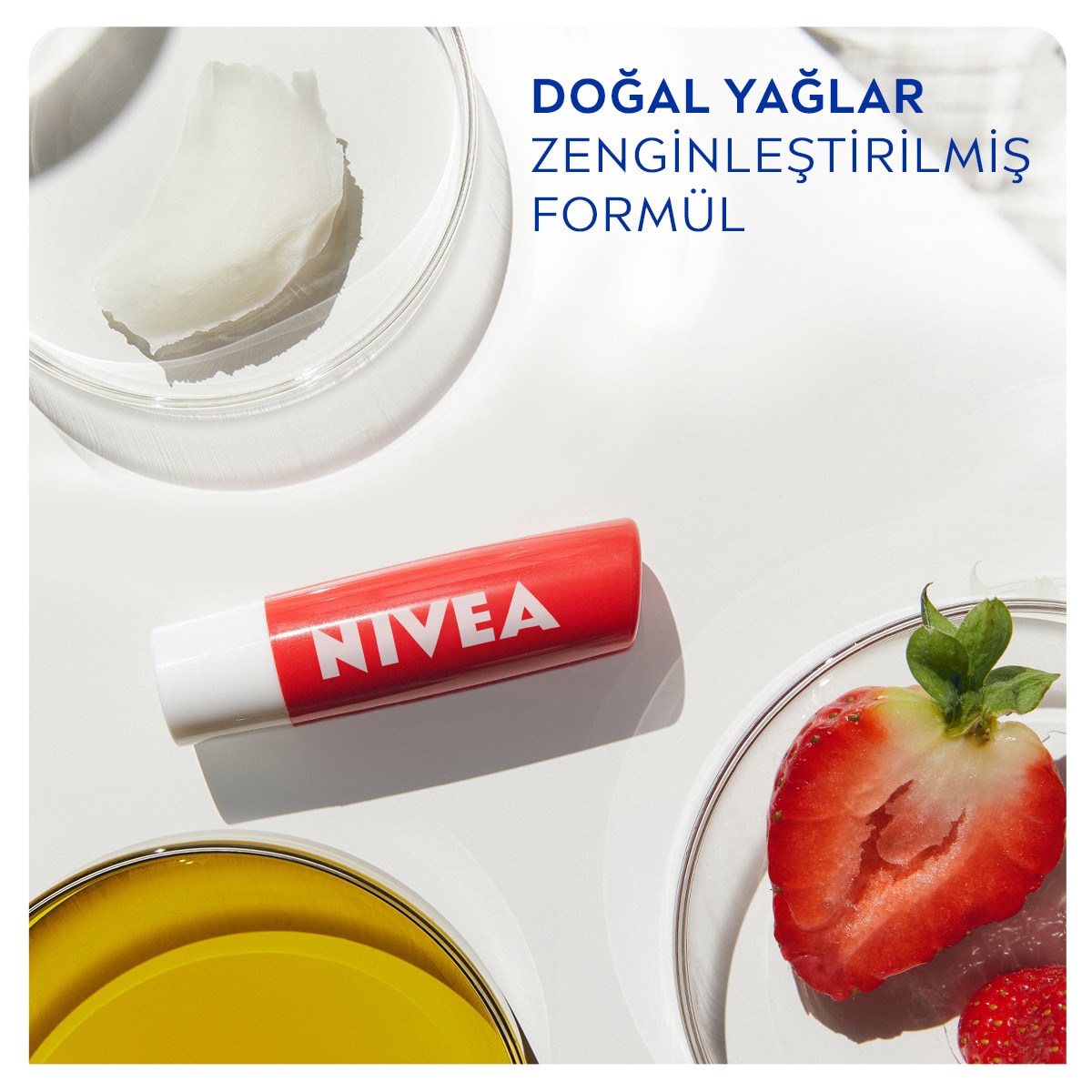  NIVEA LIP CARE NIVEA LIP CARE Nivea Dudak Bakım Kremi ve Dudak Parlatıcı Çilek 4,8 g 24 Saat Nem  1 of 6 