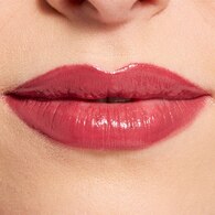 REVOLUTION POUT LIP GLOSS STICK CREME BRULEE MAUVE