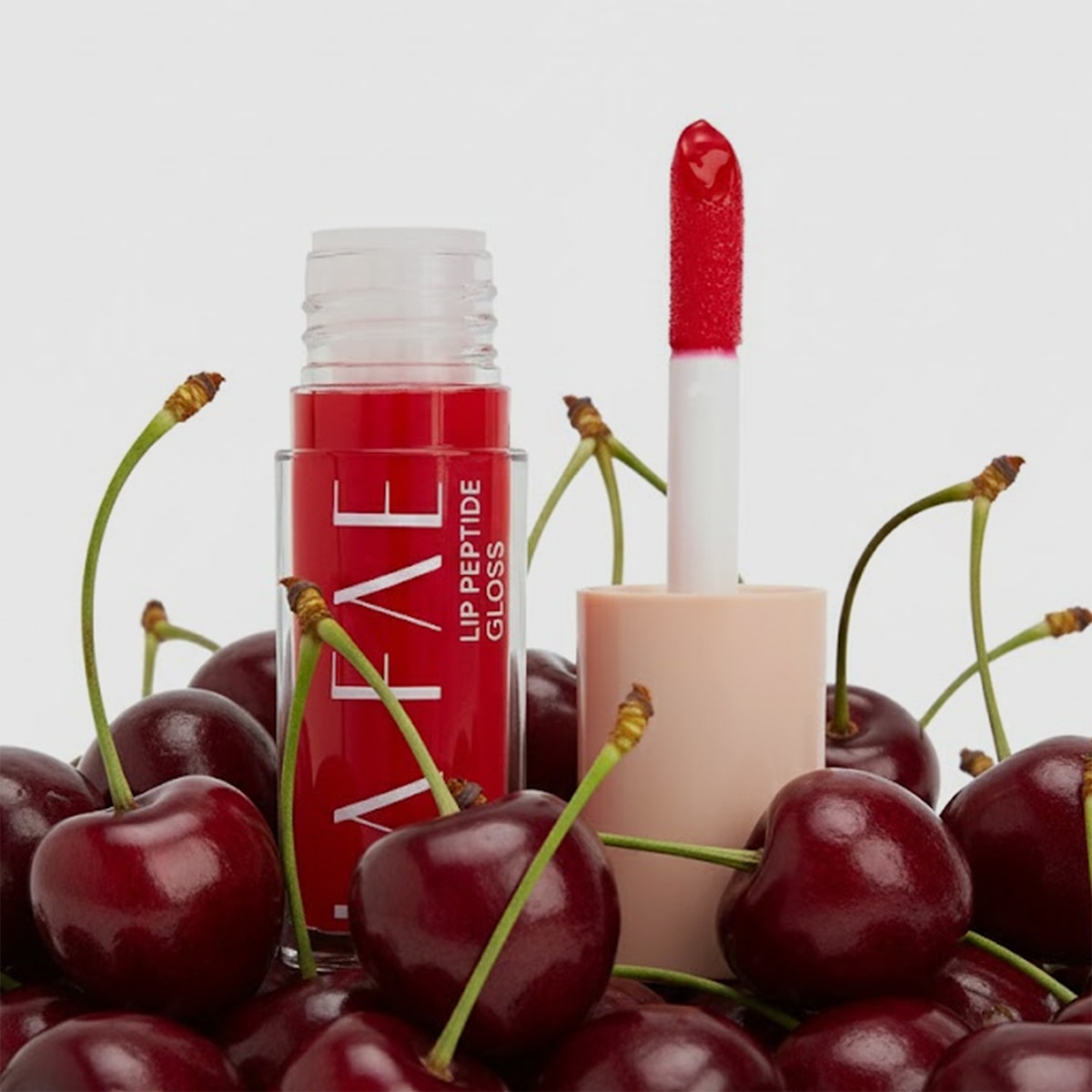  LA FAE LA FAE La Faé Lip Peptide Gloss Cherry Swirl  1 of 7 